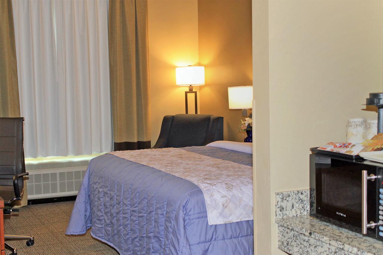 Heartland Inn And Suites Wheatland Bagian luar foto