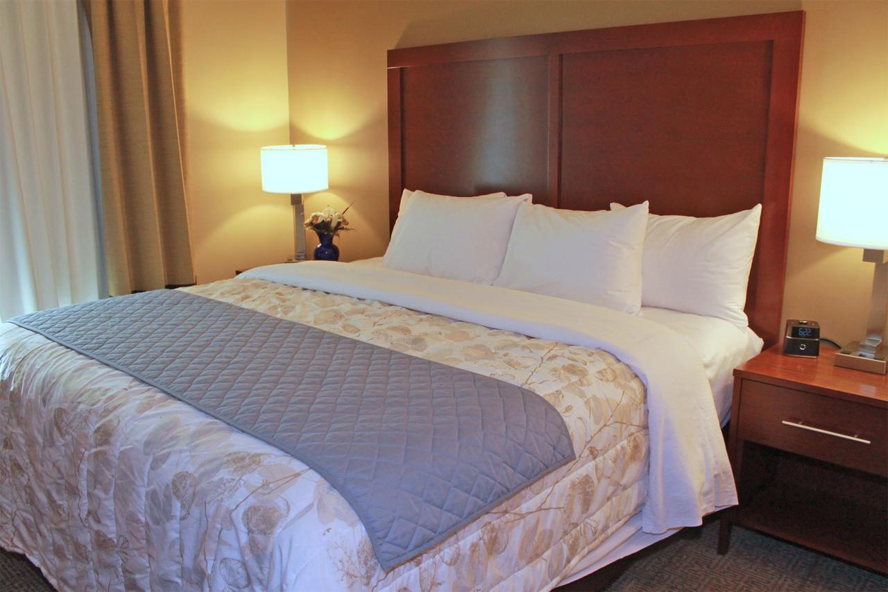 Heartland Inn And Suites Wheatland Bagian luar foto