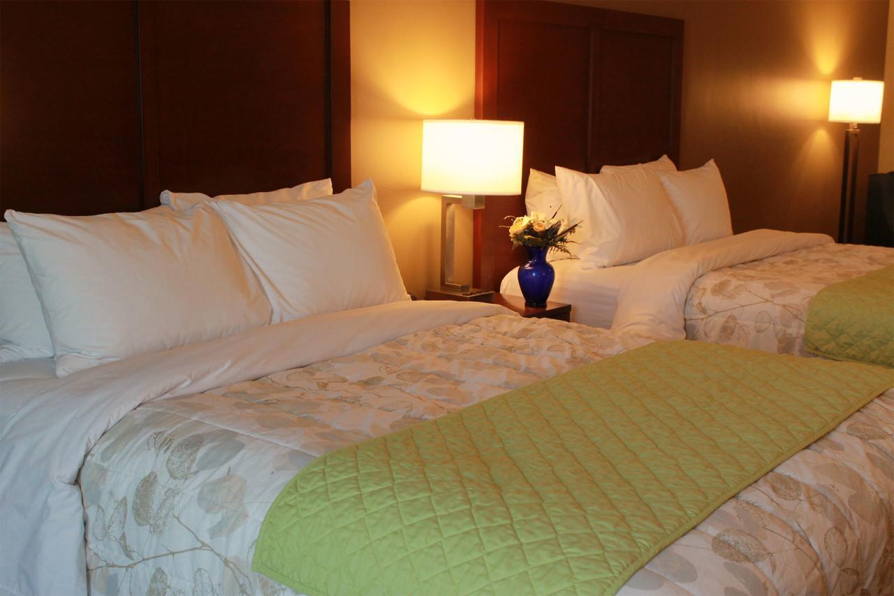 Heartland Inn And Suites Wheatland Bagian luar foto