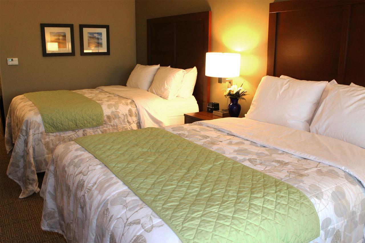 Heartland Inn And Suites Wheatland Bagian luar foto