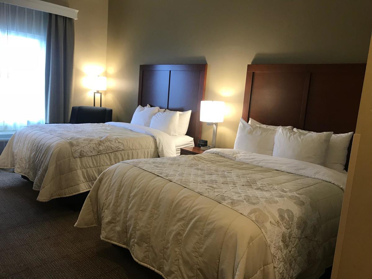 Heartland Inn And Suites Wheatland Bagian luar foto